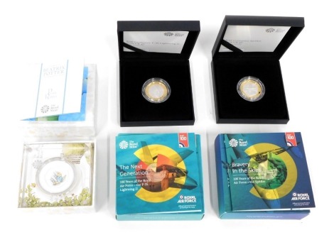 A Royal Mint Centenary Spitfire 2008 two pound silver proof coin, Beatrix Potter The Royal Mint proof fifty pence and an RAF Centenary two pound silver proof coin, each boxed in outer case with paperwork. (2)