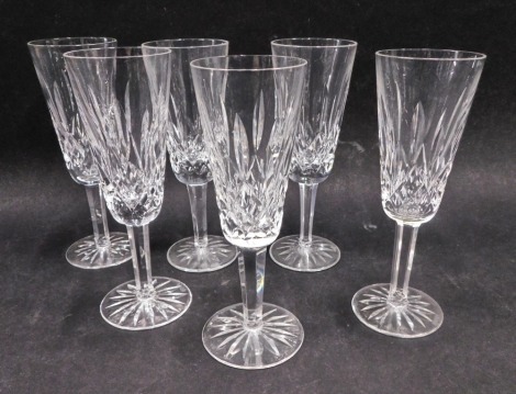 A set of six Waterford crystal champagne flutes, marked beneath, 15cm high. (6)