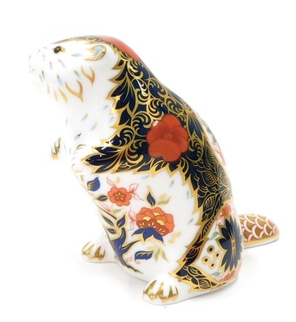 A Royal Crown Derby paperweight ornament Old Imari Beaver, gilt stopper, printed marks beneath, 10cm high.