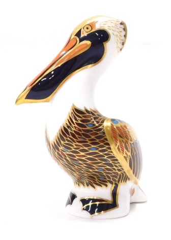 A Royal Crown Derby paperweight ornament Brown Pelican, octagonal 21 year gilt stopper, printed marks beneath, 14cm high.