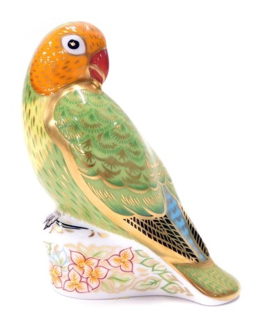 A Royal Crown Derby paperweight ornament Red Faced Lovebird, limited edition, gilt stopper, printed marks beneath, 10cm high.