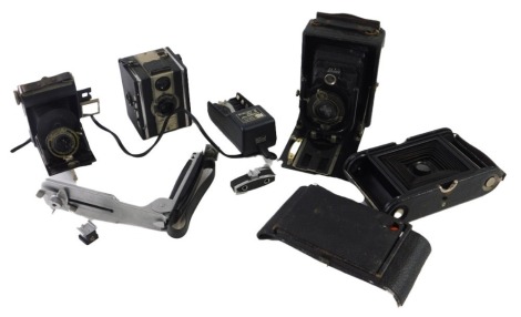 Various cameras and related items, a Coronet Twelve-20, 12cm high, folding cameras, etc. (a quantity) WARNING! This lot contains untested or unsafe electrical items. It is supplied for scrap or re-conditioning only. TRADE ONLY