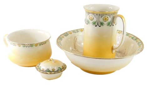 An early 20thC pottery wash set, decorated with flowers on a yellow and white ground, to include jug, bowl, 42cm diameter, chamber pot, soap dish, etc. (a quantity)