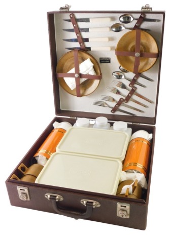 A Sirram vintage picnic hamper, with wooden cups, flasks, Brexton storage boxes, 26cm wide, etc., in pressed case.