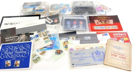 Various stamps, collectors stamps, etc., loose examples, QEII and others, some on envelopes, stamp sets, etc. (a quantity)