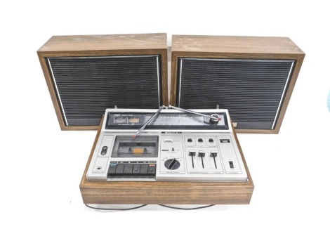 A Sony FM stereo cassette recorder, with two speakers, 9cm high, and a Matsui CD player. WARNING! This lot contains untested or unsafe electrical items. It is supplied for scrap or re-conditioning only. TRADE ONLY