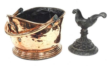 A copper coal helmet, with swing handle, 18cm high, and an iron ewer.