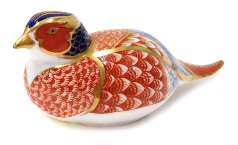 A Royal Crown Derby paperweight ornament Imari Pheasant, lacking stopper, printed marks beneath, 7cm high.