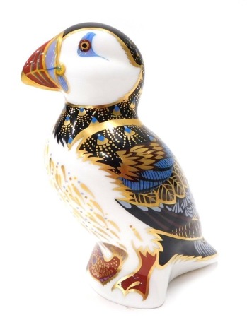 A Royal Crown Derby paperweight ornament Puffin, with gilt stopper, printed marks beneath, 13cm high.