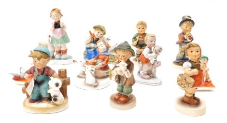 Various Goebel Hummel figures, boy holding lamb, 12cm high, and various others, other similar, some unmarked, etc. (a quantity)