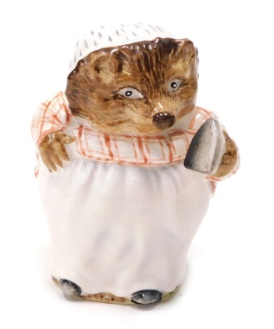 A Beswick Beatrix Potter figure Mrs Tiggy-Winkle, gold oval mark, 10cm high.