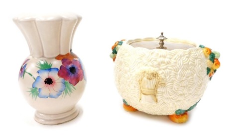 A Clarice Cliff Celtic Harvest pattern bowl, 11cm high, and a Pansy pattern table lamp. (2)