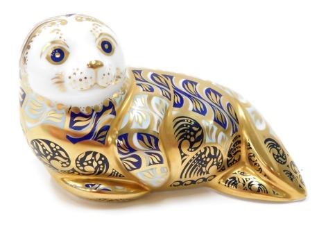 A Royal Crown Derby paperweight ornament Harbour Seal, limited edition number 2455/4500, gilt stopper, 8cm high.