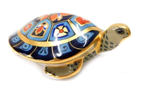 A Royal Crown Derby paperweight ornament Terrapin, lacking stopper, printed marks beneath, 9cm long.