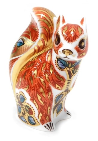 A Royal Crown Derby paperweight ornament Woodland Squirrel, gilt stopper, printed marks beneath, 13cm high.