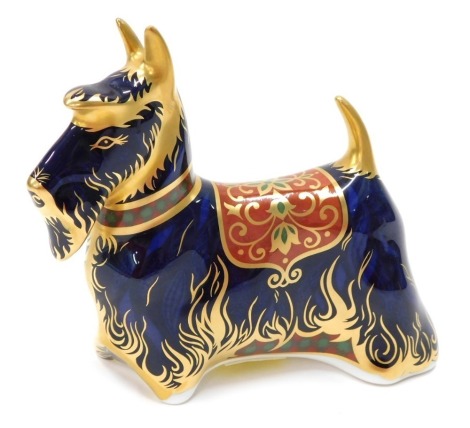 A Royal Crown Derby paperweight ornament Scottish Terrier, gilt stopper, printed marks beneath, 12cm high.