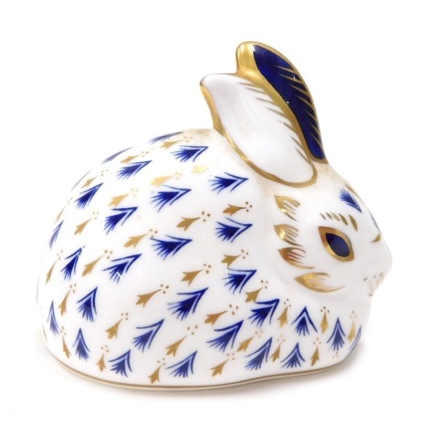 A Royal Crown Derby paperweight ornament Rabbit, lacking stopper, printed marks beneath, 7cm high.