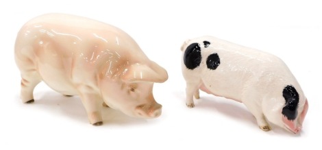 A Goebel figure of a pig, 10cm high, and a Royal Doulton figure of a pig. (2)