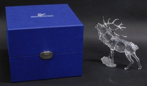 A Swarovski crystal figurine stag, 291431, 13cm high. (boxed)