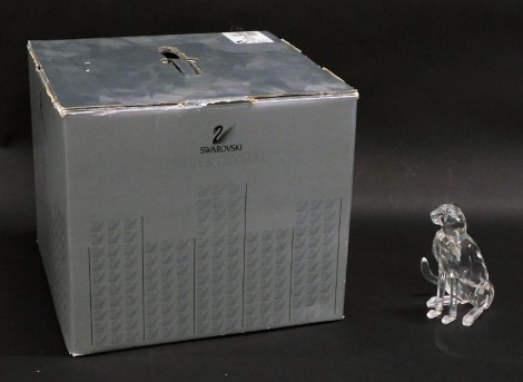 A Swarovski crystal cheetah figurine, 183225, 11cm high. (boxed)