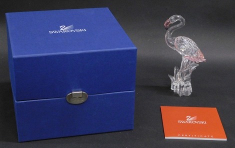 A Swarovski bicoloured crystal figurine flamingo, 15cm high, boxed.