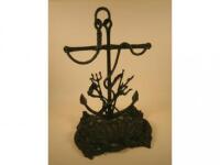 A Victorian cast iron stick or whip stand cast with an anchor and tridents