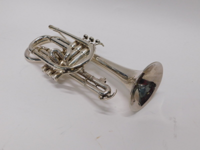 A Conn 34A cornet, with three mother of pearl finished valves, 37cm long. (cased) - 2