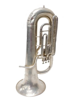 A Boosey & Hawkes Regent Marching tuba, with three buttons, 82cm high, in canvas case.