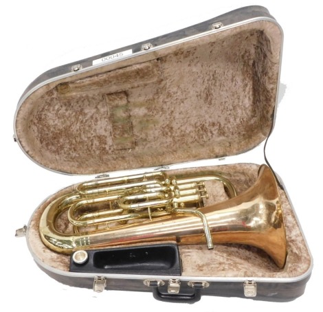 A Concesto brass euphonium, with chrome mounts and three valves, 72cm high, with separate mouthpiece. (cased)