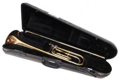 A Yamaha YB301 brass baritone horn, with three valves, 60cm high, separate mouthpiece. (cased)