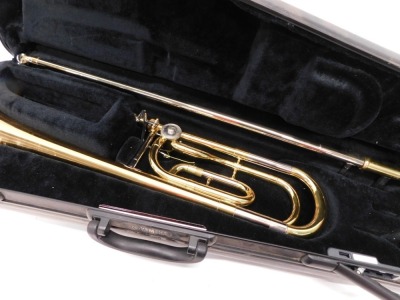 A Yamaha YB301 brass baritone horn, with three valves, 60cm high, separate mouthpiece. (cased) - 2