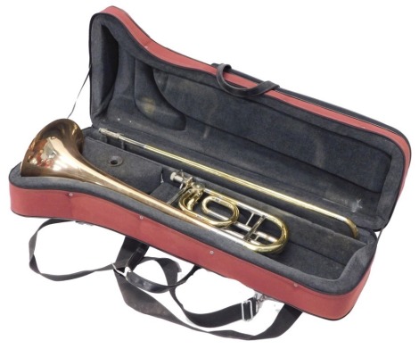 A brass two piece trombone, with chrome mounts, the horn section 65cm long. (in canvas case)