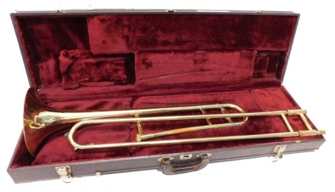 A Boosey & Hawkes 400 two piece brass trombone, the horn section 70cm long. (cased)