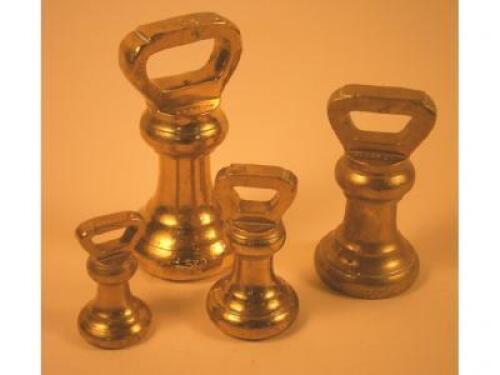 An associated set of four brass weights