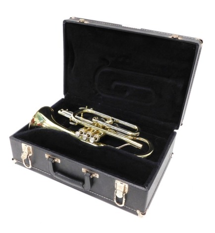 A Blessing brass cornet, with three valves, 37cm long, with separate mouthpiece. (cased)