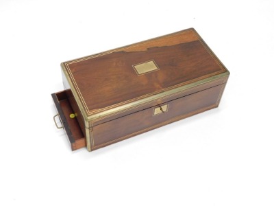 An early Victorian rosewood and brass campaign style writing box, the hinged top enclosing a tooled leather writing surface and various fitted compartments, 20cm high, 56cm wide, 28cm deep. - 4