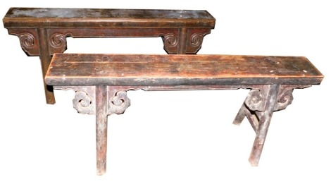 A late 19th/early 20thC Chinese elm bench, with channelled supports, shaped brackets and another similar, 104cm wide. This lot is located at Oundle, Near Peterborough, PE8, viewing and collection by appointment only by calling our Lincoln office 01522 524