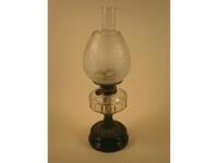 A Victorian oil lamp, the frosted glass shade decorated with flowers with