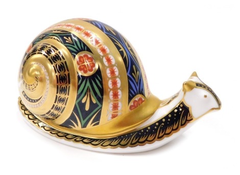 A Royal Crown Derby paperweight ornament Garden Snail, limited edition number 4037/4500, gilt stopper, printed marks beneath, 9cm high.