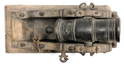 A 19thC Continental bronze mortar cannon, sitting within a painted wooden and cast iron carriage, 43cm wide. - 3