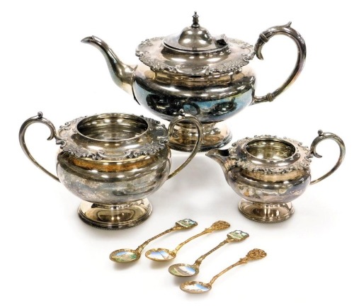 A 19thC Pearson Brothers of Nottingham silver plated three piece tea set, of baluster form, with an embossed floral and rococo scroll rim, comprising teapot, sugar bowl and cream jug, together with four Russian gilt metal and enamel commemorative tea spoo