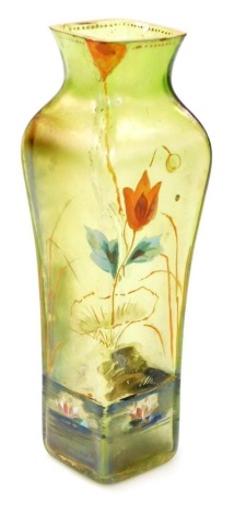 An early 20thC iridescent glass vase, of shouldered square tapering form, with hand painted decoration of a lake with water lilies and other flowering plants, 21cm high.