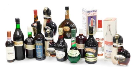 A group of alcohol, including Baileys Original, three bottles of Sheridan's Irish coffee layered liqueur, Smirnoff vodka, Sans Rival ouzo, and Muscat Lunel. (a quantity)