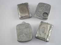 Two similar silver plated coin cases with engraving type decoration