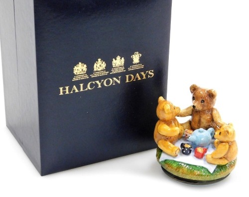 A Halcyon Days Harrods enamel and porcelain bonbonniere, box number 25, 6cm high, boxed.