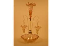 A Victorian Cranberry and white tinted epergne