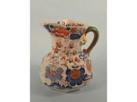 A 19thC Masons ironstone hydra type octagonal jug decorated in Imari colours