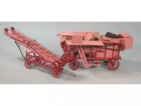 A scratch built model of a Foster of Lincoln threshing machine painted