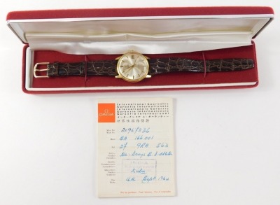 An Omega Seamaster automatic wristwatch, the silvered 3cm diameter dial with baton pointers and numerals, with date aperture and textured leather strap, with outer case and paperwork. - 3