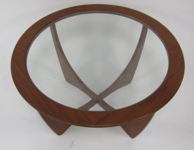 A mid century G-Plan teak Astro coffee table, the circular top inset with a glass panel above two inter-crossed U section supports, 44cm high, the top 83cm diameter. - 2